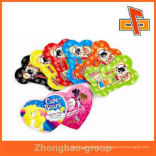 Fashion custom-made heart-shaped or bone shape unique shape bags for pet food from china manufacturer